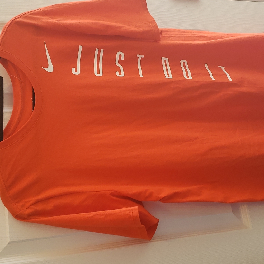 Orange Nike shirt